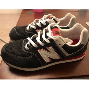 New balance 574 Navy blue big kids size 7 womens size 8.5